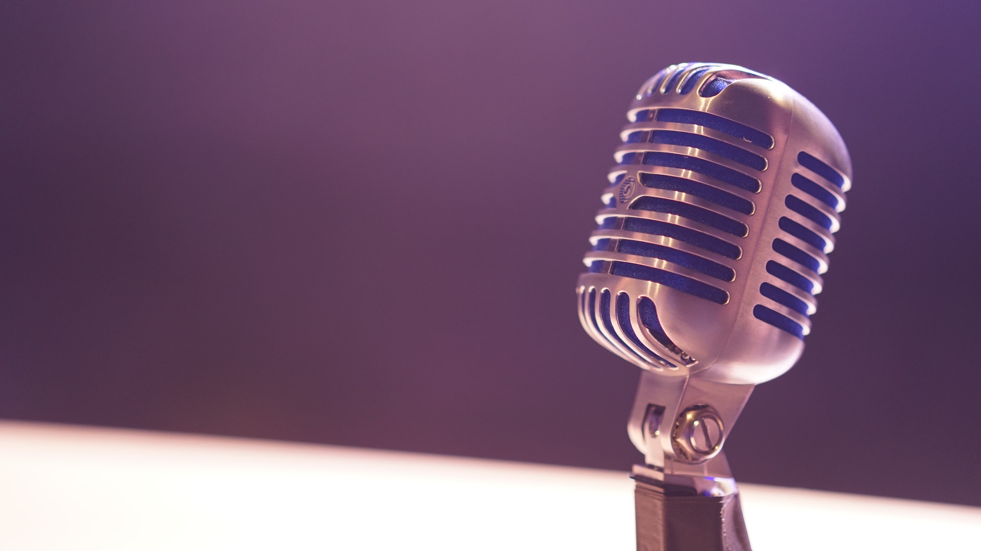 A microphone looking out over an empty room